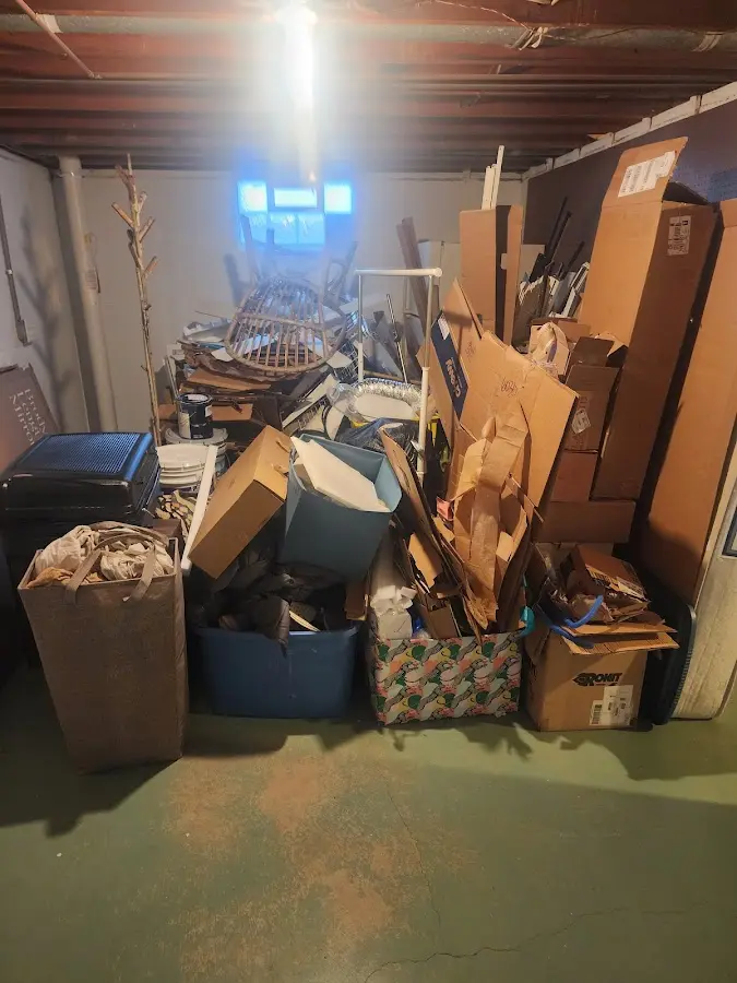 Roll-off dumpster container at job site for Yard Waste Dumpster Rental in Colby